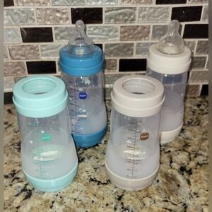 (4) MAM Easy Start Anti-Colic 9oz Baby Bottles (2) Size 2 Nipples